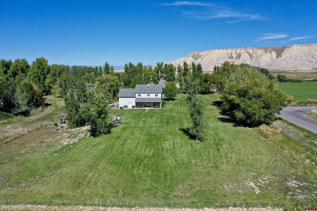 bird's eye view with a mountain view and a rural view