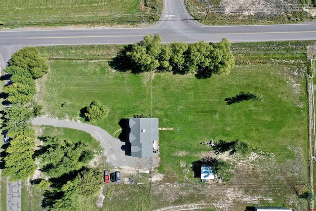 birds eye view of property featuring a rural view