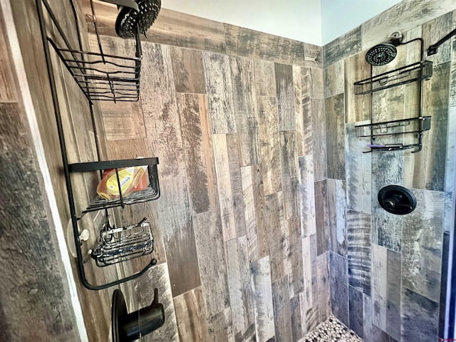 full bath featuring tiled shower