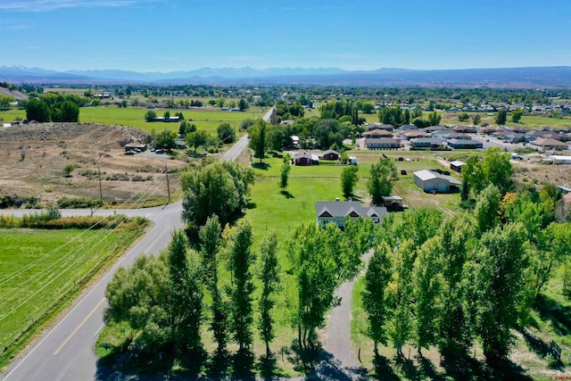 drone / aerial view featuring a mountain view