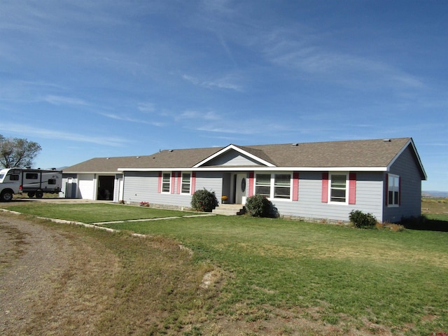 single story home featuring a front yard