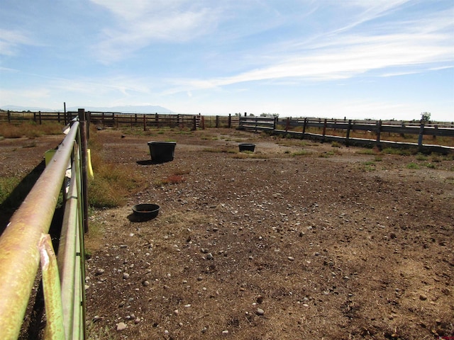 view of yard featuring a rural view