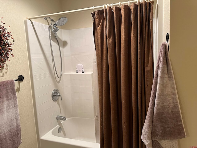 bathroom featuring shower / tub combo with curtain