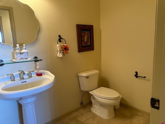 bathroom featuring toilet