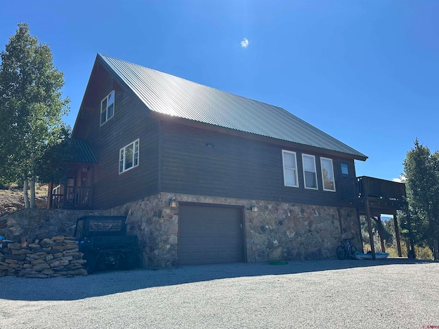 view of side of property featuring a garage