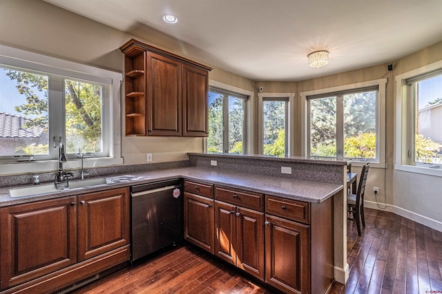 kitchen with dishwasher, sink, dark hardwood / wood-style flooring, and kitchen peninsula