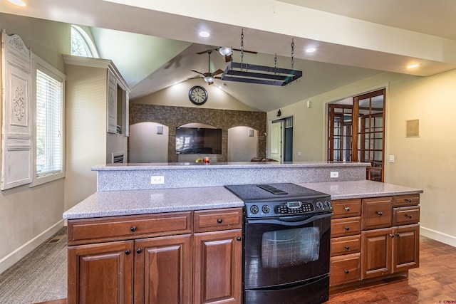 kitchen with a kitchen island, dark hardwood / wood-style flooring, lofted ceiling, black range with electric cooktop, and ceiling fan