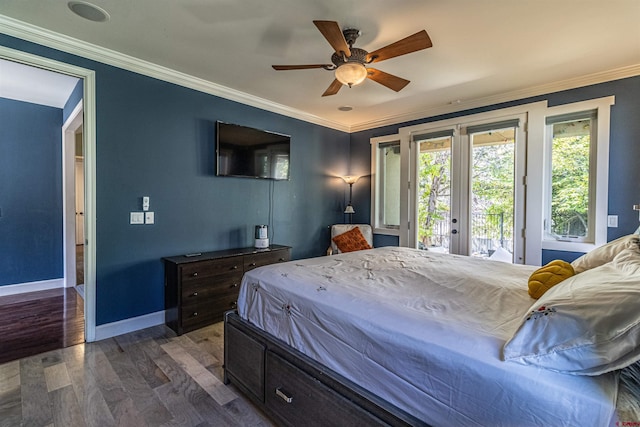 bedroom with dark wood-type flooring, ceiling fan, french doors, access to outside, and ornamental molding