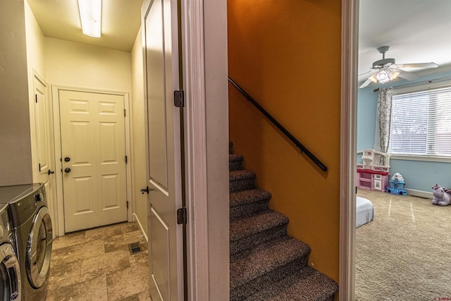 interior space featuring ceiling fan, washer and dryer, and carpet