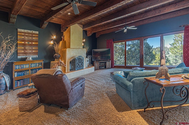 living room featuring wooden ceiling, beam ceiling, a large fireplace, and ceiling fan