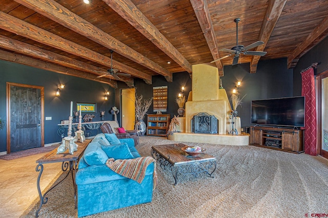 tiled living room featuring wood ceiling, a fireplace, ceiling fan, and beamed ceiling