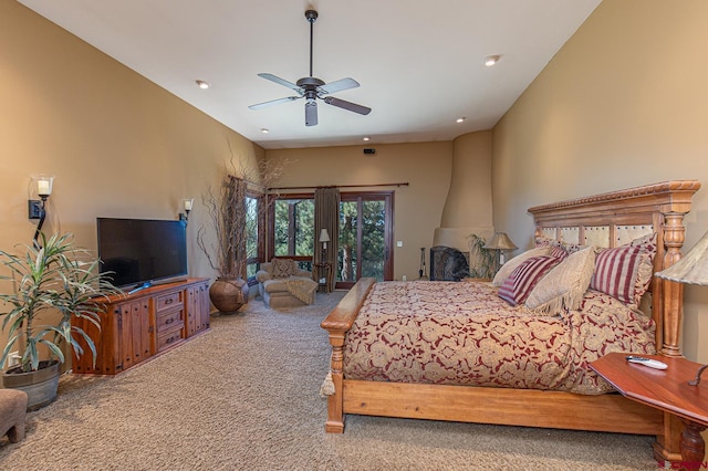 carpeted bedroom with ceiling fan and access to exterior