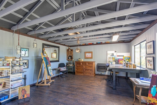 miscellaneous room featuring vaulted ceiling with beams, dark hardwood / wood-style floors, and heating unit