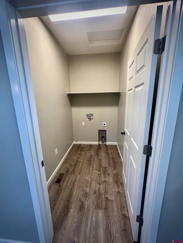 laundry room with hookup for an electric dryer, dark hardwood / wood-style floors, and hookup for a washing machine