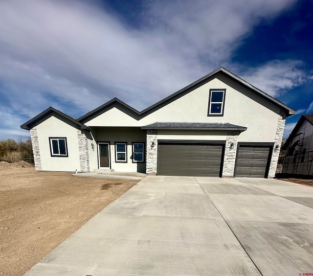 view of front of home with a garage