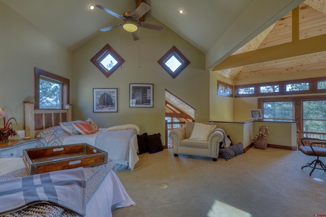 carpeted bedroom featuring ceiling fan, beam ceiling, and high vaulted ceiling