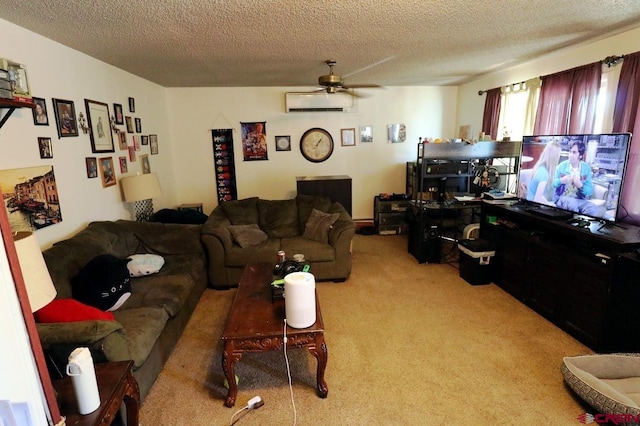 living room with a textured ceiling, a wall unit AC, ceiling fan, and light colored carpet