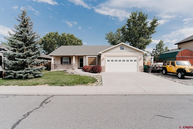 view of front of house with a garage and a front yard