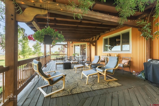 deck with an outdoor hangout area