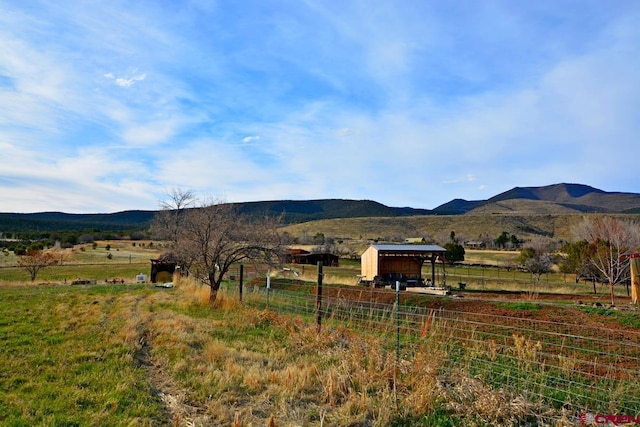 mountain view featuring a rural view