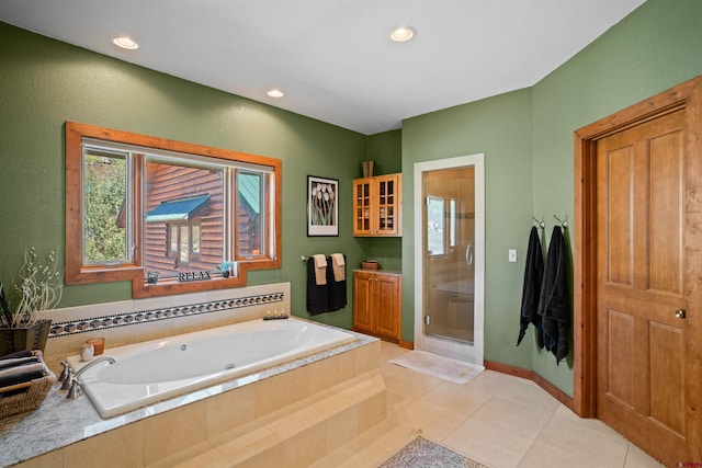 bathroom with plus walk in shower and tile patterned floors