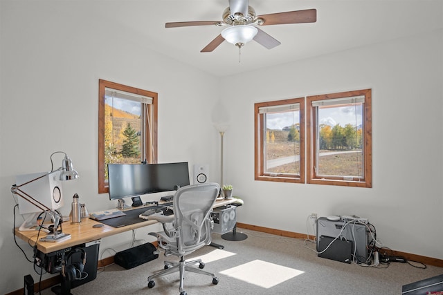 office featuring carpet and ceiling fan