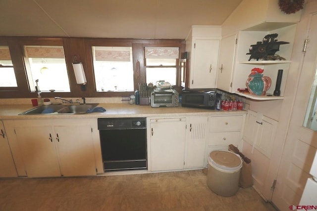 410 E Empire St, Cortez, CO 81321 - kitchen with black appliances, a sink, light countertops, and white cabinets