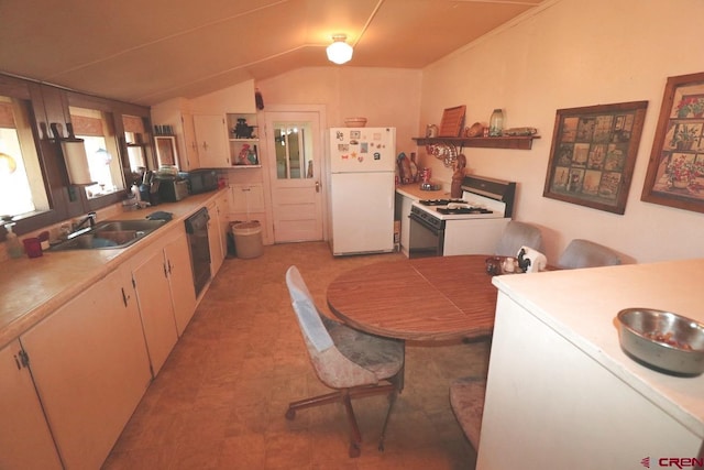 kitchen featuring lofted ceiling, white appliances, and sink