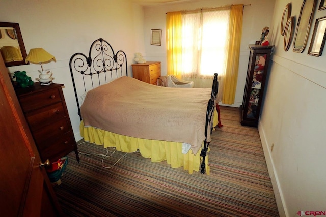 410 E Empire St, Cortez, CO 81321 - carpeted bedroom with baseboards