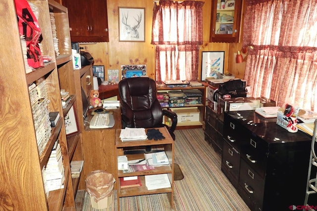 office space featuring wooden walls