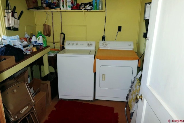 washroom with washing machine and dryer