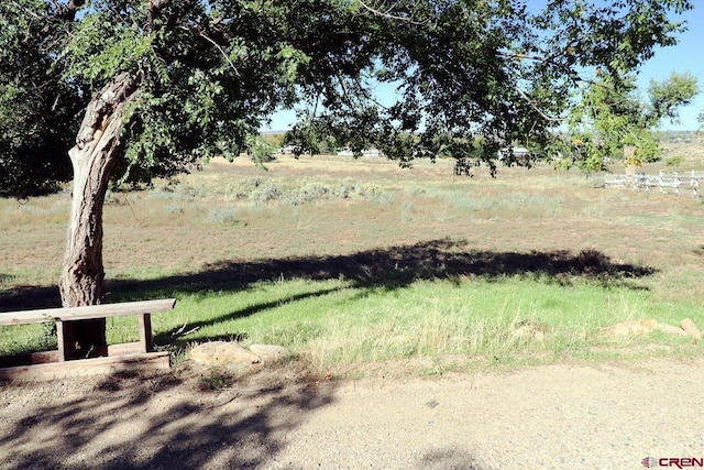 410 E Empire St, Cortez, CO 81321 - view of yard with a rural view