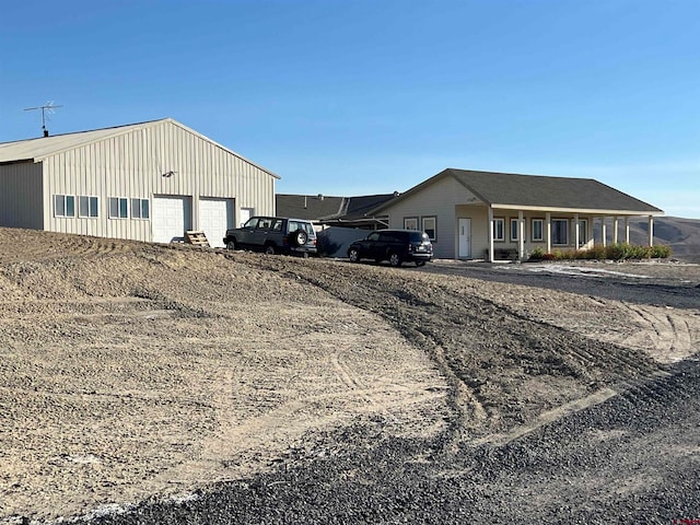 view of property exterior with a garage