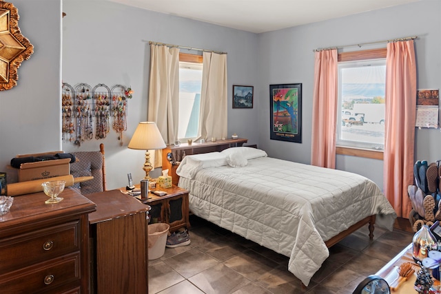 bedroom featuring tile patterned floors