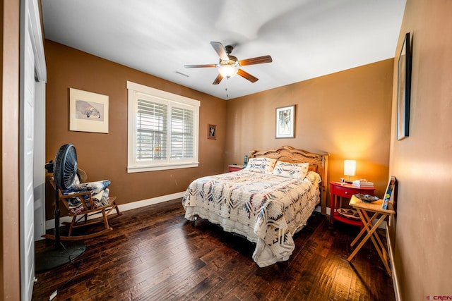 bedroom featuring ceiling fan and hardwood / wood-style flooring