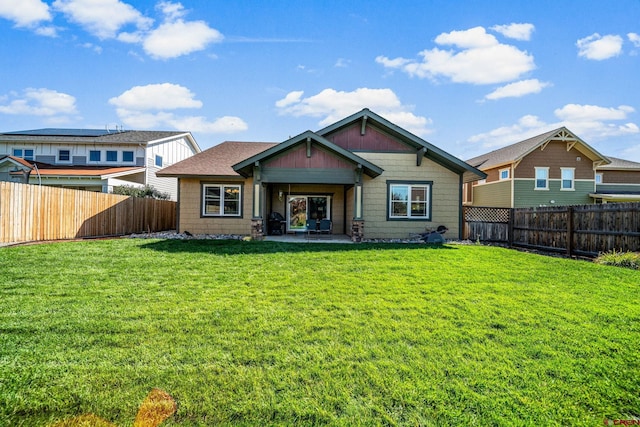 505 Prospector Ave, Durango, CO 81301 - back of house featuring a yard, a fenced backyard, and a patio area