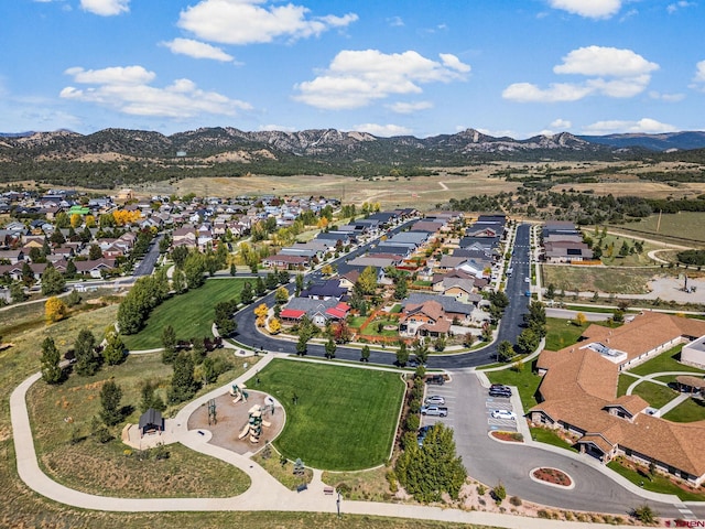 drone / aerial view featuring a mountain view