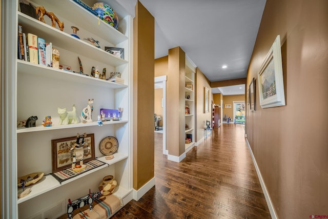 505 Prospector Ave, Durango, CO 81301 - hall with built in features, dark wood-style flooring, and baseboards