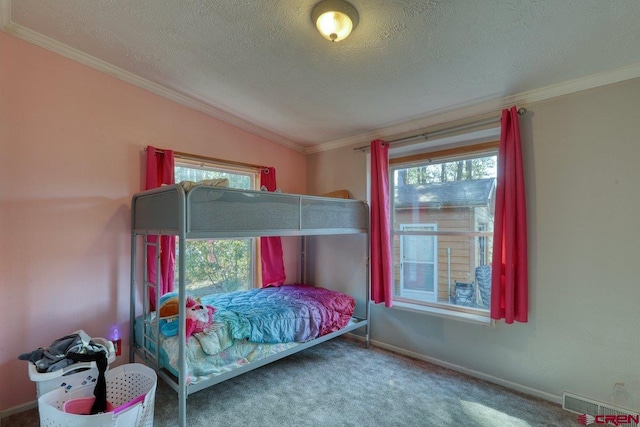 bedroom featuring carpet flooring, crown molding, vaulted ceiling, and multiple windows