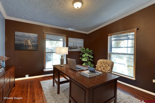 office space with a textured ceiling, crown molding, and dark wood-type flooring