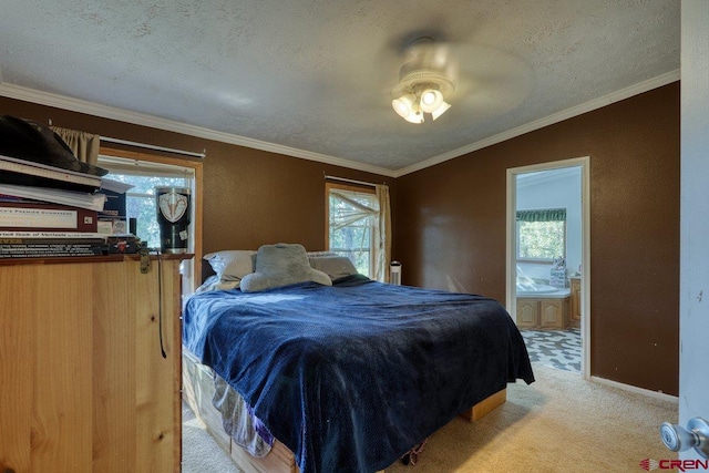 bedroom featuring ceiling fan, light colored carpet, and multiple windows