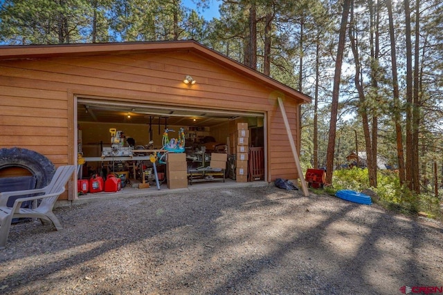 garage with wood walls