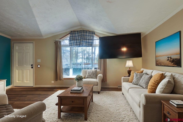 living room with a textured ceiling, lofted ceiling, ornamental molding, and dark hardwood / wood-style flooring