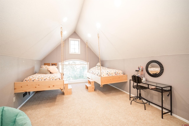 bedroom featuring carpet floors and lofted ceiling