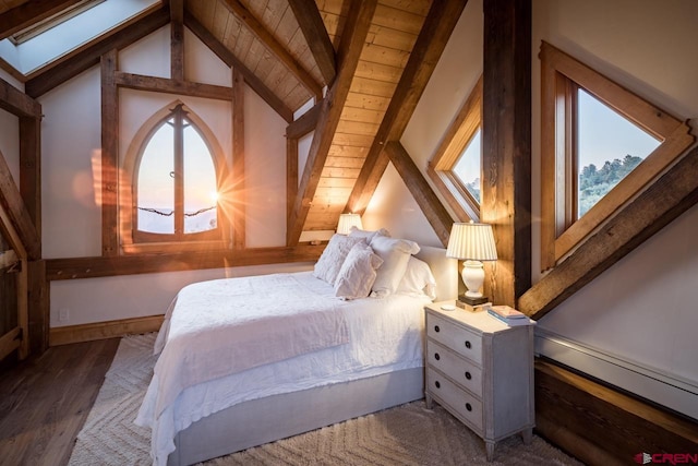 bedroom featuring lofted ceiling with skylight, multiple windows, a baseboard radiator, and dark hardwood / wood-style flooring