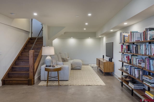 462 Dragon Lode Dr, Placerville, CO 81430 - sitting room with stairs, concrete flooring, baseboards, and recessed lighting