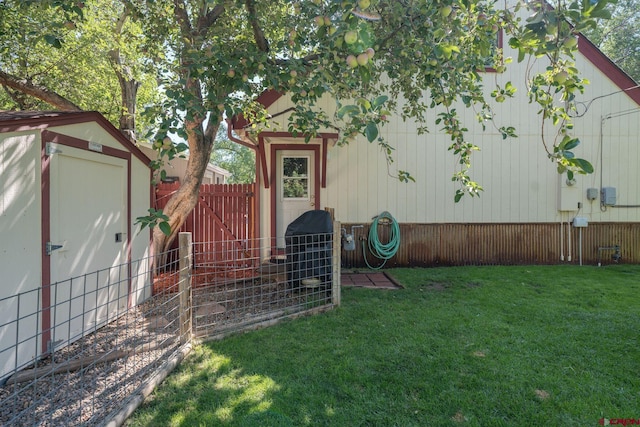 view of outdoor structure with a lawn