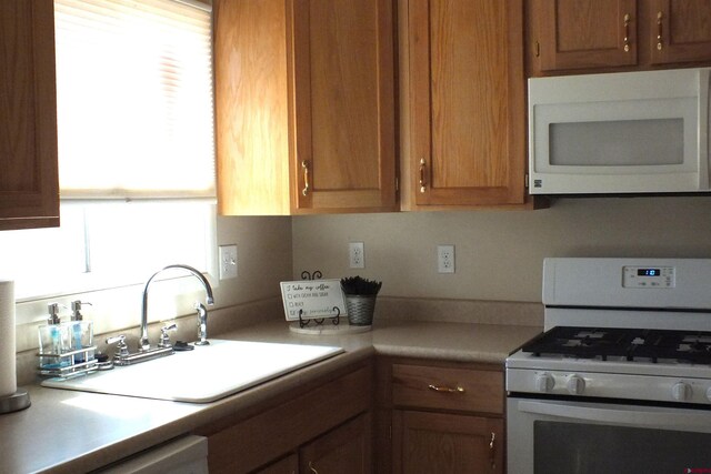 629 E 2nd St, Cortez, CO 81321 - bedroom with baseboards, a ceiling fan, and wood finished floors