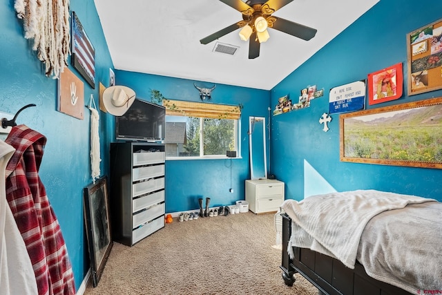 bedroom with lofted ceiling, carpet floors, and ceiling fan