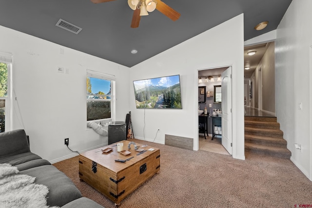 living room with high vaulted ceiling, carpet, and ceiling fan